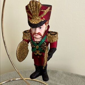 Festive Red and Gold Toy Soldier Ornament with Cymbals